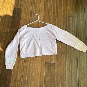 Pink long sleeve off the shoulder cropped shirt